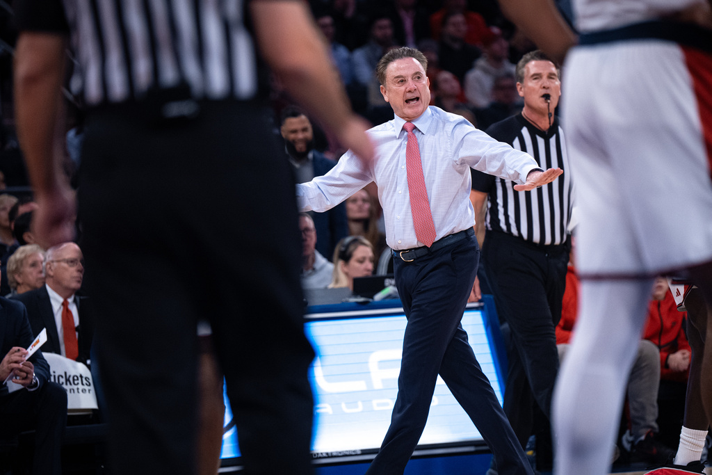 St. John's head coach Rick Pitino, center, reacts on the sideline during the first half of an NCAA college basketball game against Xavier, Monday, Feb. 9, 2026, in New York. (AP Photo/Angelina Katsanis)