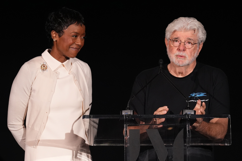 Mellody Hobson, left, and George Lucas, co-founders of the Lucas Museum of Narrative Art, appear during a press preview for the museum on Wednesday, Sept. 2, 2026, in Los Angeles. (AP Photo/Chris Pizzello)