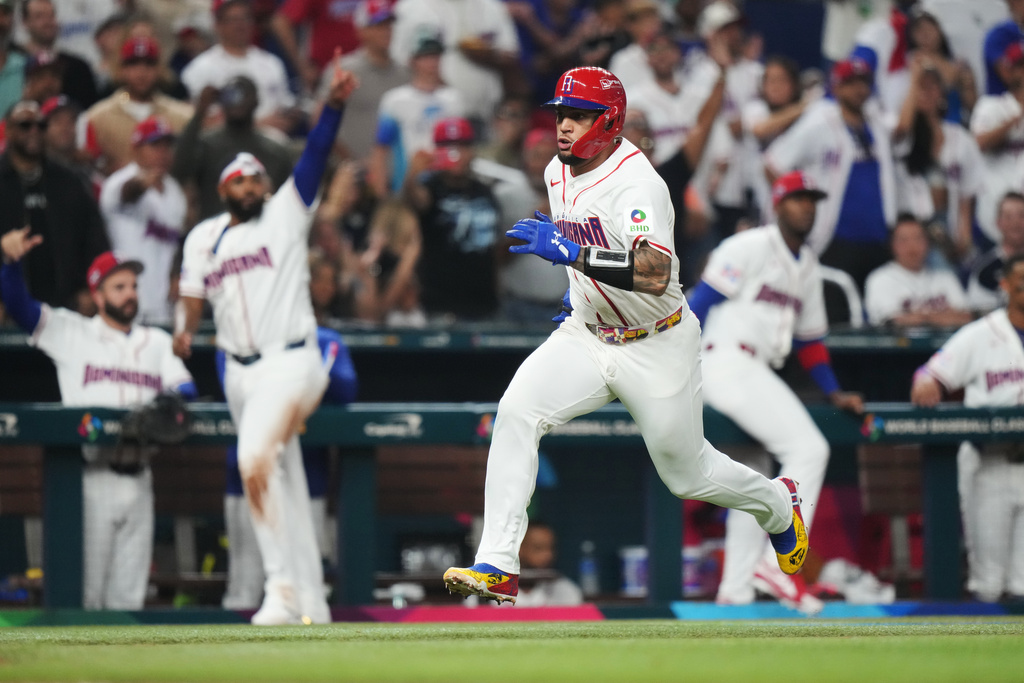Dominican Republic's Agustin Ramirez runs home on a single by Fernando Tatis Jr. during the second inning of a World Baseball Classic quarterfinal game against South Korea, Friday, March 13, 2026, in Miami. (AP Photo/Lynne Sladky)