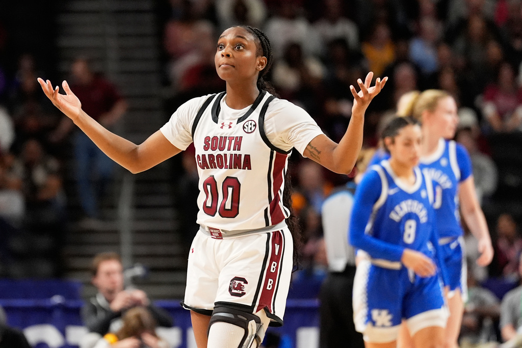 South Carolina guard Ta'niya Latson reacts during first half of an NCAA college basketball game against Kentucky in the quarterfinals of the Southeastern Conference tournament, Friday, March 6, 2026, in Greenville, S.C. (AP Photo/Chris Carlson)