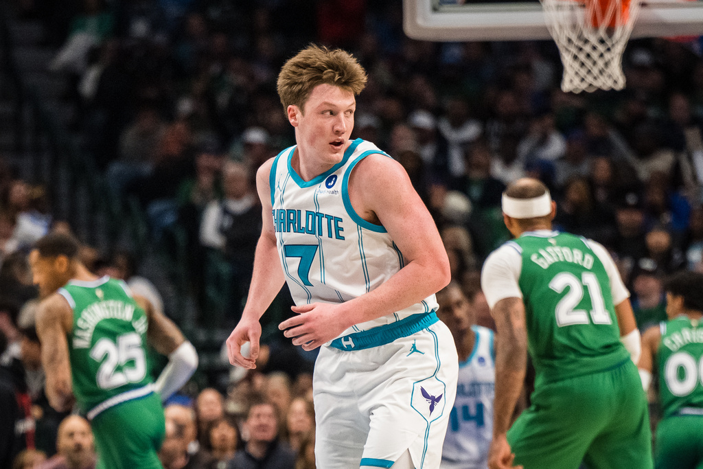 Charlotte Hornets guard Kon Knueppel (7) looks to a teammate during an NBA basketball game against the Dallas Mavericks, Thursday, Jan. 29, 2026, in Dallas. (AP Photo/Jessica Tobias)