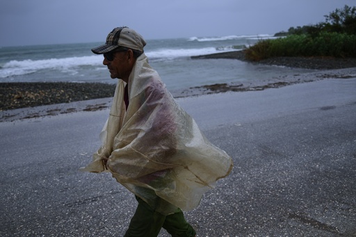 A man walks in the rain before the arrival of Hurricane Melissa in Canizo, a community in Santiago de Cuba, Tuesday, Oct. 28, 2025. (AP Photo/Ramón Espinosa) A man walks in the rain before the arrival of Hurricane Melissa in Canizo, a community in Santiago de Cuba, Tuesday, Oct. 28, 2025. (AP Photo/Ramón Espinosa)