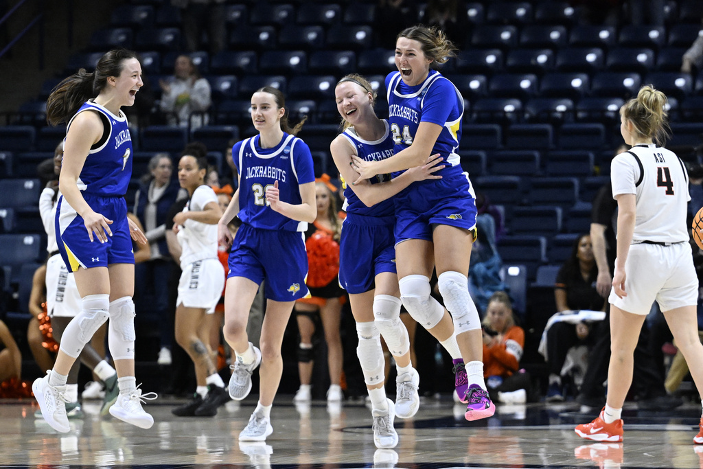 South Dakota State celebrates their win over Oklahoma State in the first round of the NCAA college basketball tournament, Saturday, March 22, 2025, in Storrs, Conn. (AP Photo/Jessica Hill)