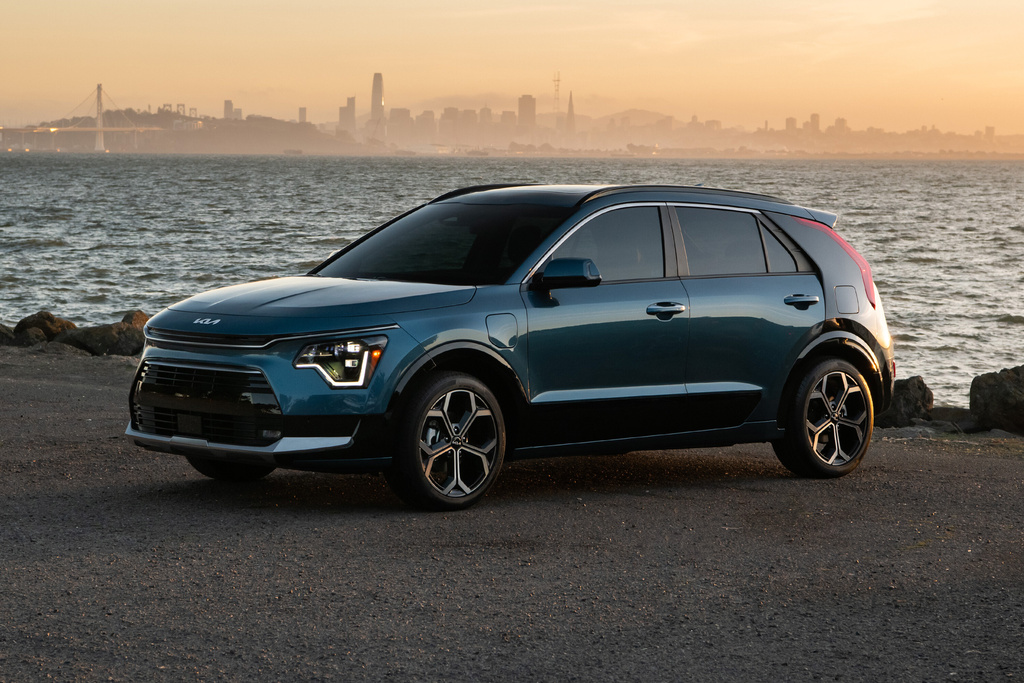 This photo provided by Kia shows the Niro Plug-in Hybrid, a small sport utility vehicle with up to 33 miles of EV range and advanced driver tech. (Robin Trajano/Kia America via AP)