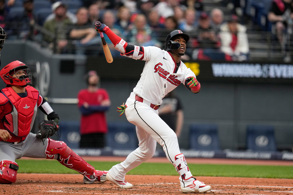 Cleveland Guardians' Angel Martínez watches his solo home run in the third inning of a baseball game against the Los Angeles Angels in Cleveland, Tuesday, May 12, 2026. (AP Photo/Sue Ogrocki)