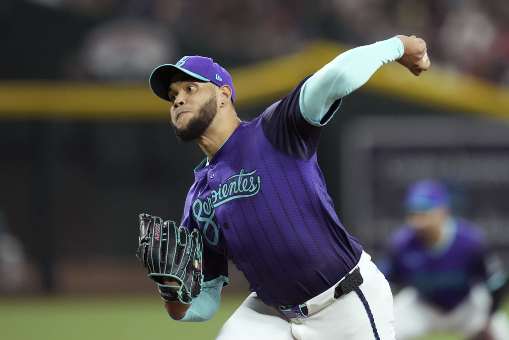 Arizona Diamondbacks starting pitcher Eduardo Rodriguez throws against the Boston Red Sox during the first inning of a baseball game Friday, Sept. 5, 2025, in Phoenix. (AP Photo/Ross D. Franklin)