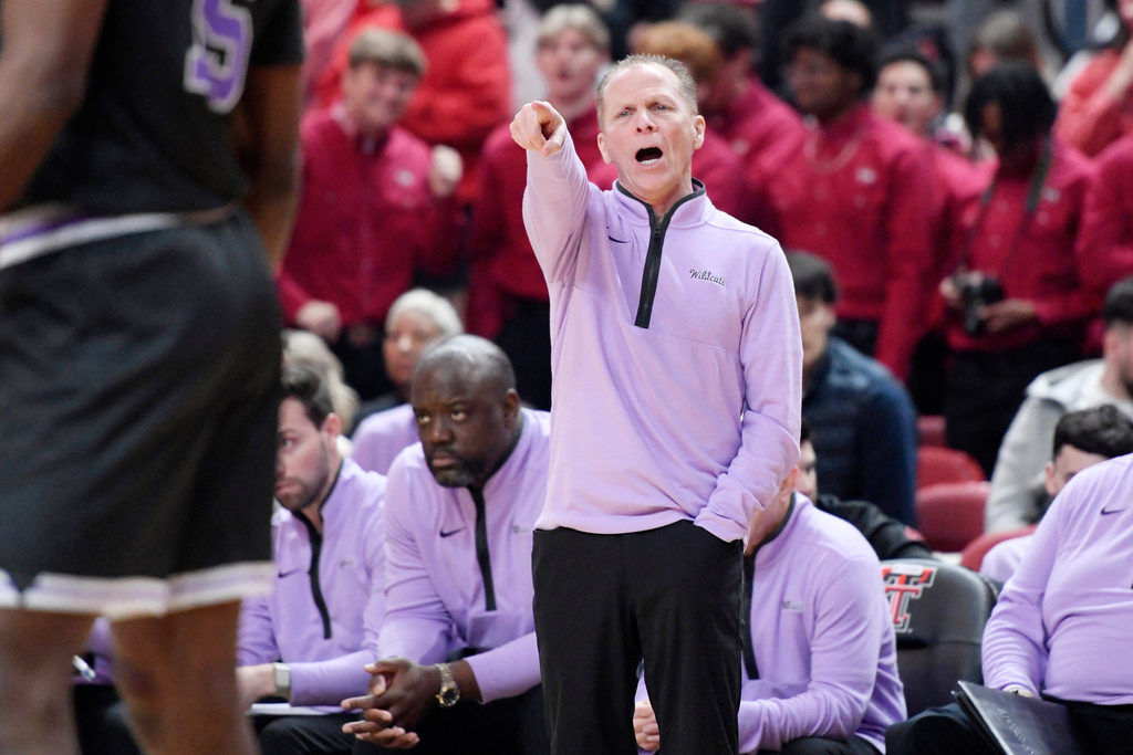 Kansas State interim head coach Matthew Driscoll yells instructions during the first half in an NCAA college basketball game against Texas Tech, Saturday, Feb. 21, 2026, in Lubbock, Texas. (AP Photo/Annie Rice)