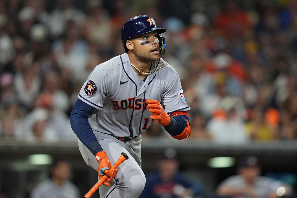 Houston Astros' Cam Smith watches his single during the eighth inning of a baseball game against the San Diego Padres Friday, Aug. 7, 2026, in San Diego. (AP Photo/Gregory Bull)