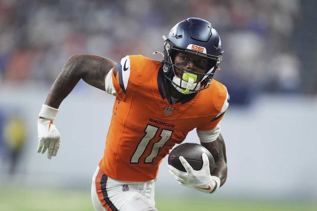 Denver Broncos wide receiver Troy Franklin runs during the second half an NFL football game against the Indianapolis Colts, Sunday, Sept. 14, 2025, in Indianapolis. (AP Photo/Michael Conroy)