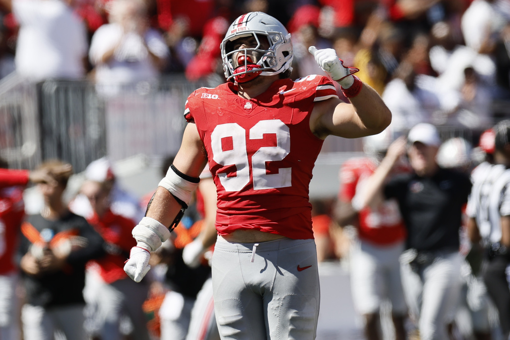 Ohio State defensive lineman Caden Curry celebrates their win over Texas in an NCAA college football game, Saturday, Aug. 30, 2025, in Columbus, Ohio. (AP Photo/Jay LaPrete)