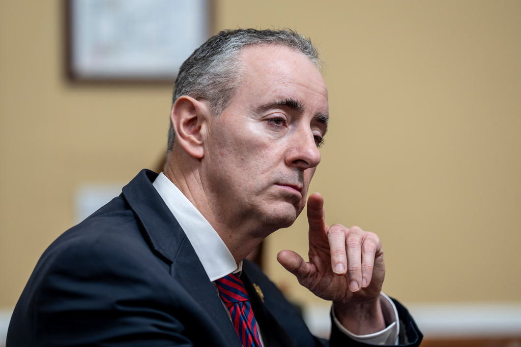 FILE - Rep. Brian Fitzpatrick, R-Pa., listens to debate as the House Rules Committee meets to prepare Republican legislation to address health care affordability, at the Capitol in Washington, Dec. 16, 2025. (AP Photo/J. Scott Applewhite, File)