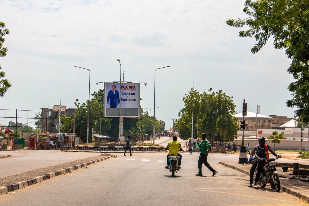 People walk on the empty streets of Garoua, northern Cameroon, Tuesday, Nov. 4, 2025. (AP Photo/Pascal Welba Yamo )