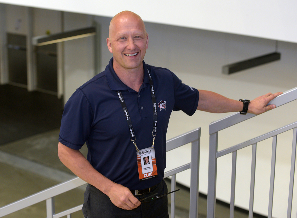 FILE - In this June 6, 2015, file photo, Columbus Blue Jackets general manager Jarmo Kekalainen poses for a photo as he watches NHL draft prospects test during the NHL Combine in Buffalo, N.Y. (AP Photo/Gary Wiepert, File)