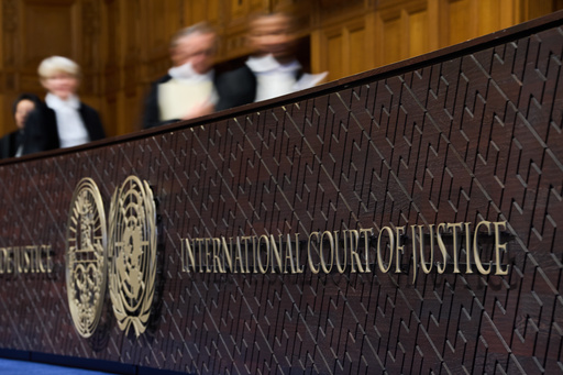 Judges walk to their seats before reading the advisory opinion of the International Court of Justice on what Israel must do to ensure humanitarian aid reaches Palestinians in Gaza and the occupied West Bank, in The Hague, Netherlands, Wednesday, Oct. 22, 2025. (AP Photo/Peter Dejong) Judges walk to their seats before reading the advisory opinion of the International Court of Justice on what Israel must do to ensure humanitarian aid reaches Palestinians in Gaza and the occupied West Bank, in The Hague, Netherlands, Wednesday, Oct. 22, 2025. (AP Photo/Peter Dejong)
