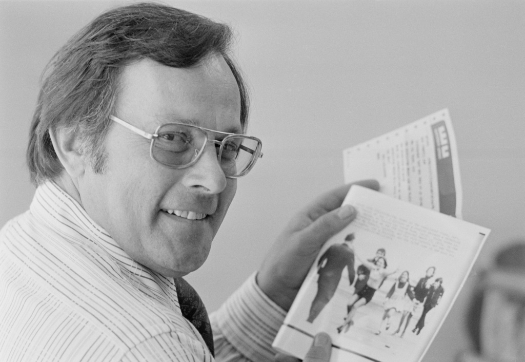 FILE - Associated Press photographer Slava "Sal" Veder holds a copy of his Pulitzer Prize winning picture and a congratulatory telegram from Wes Gallagher, AP president and general manager, in San Francisco, May 7, 1974. (AP Photo/Anthony Camerano, File)