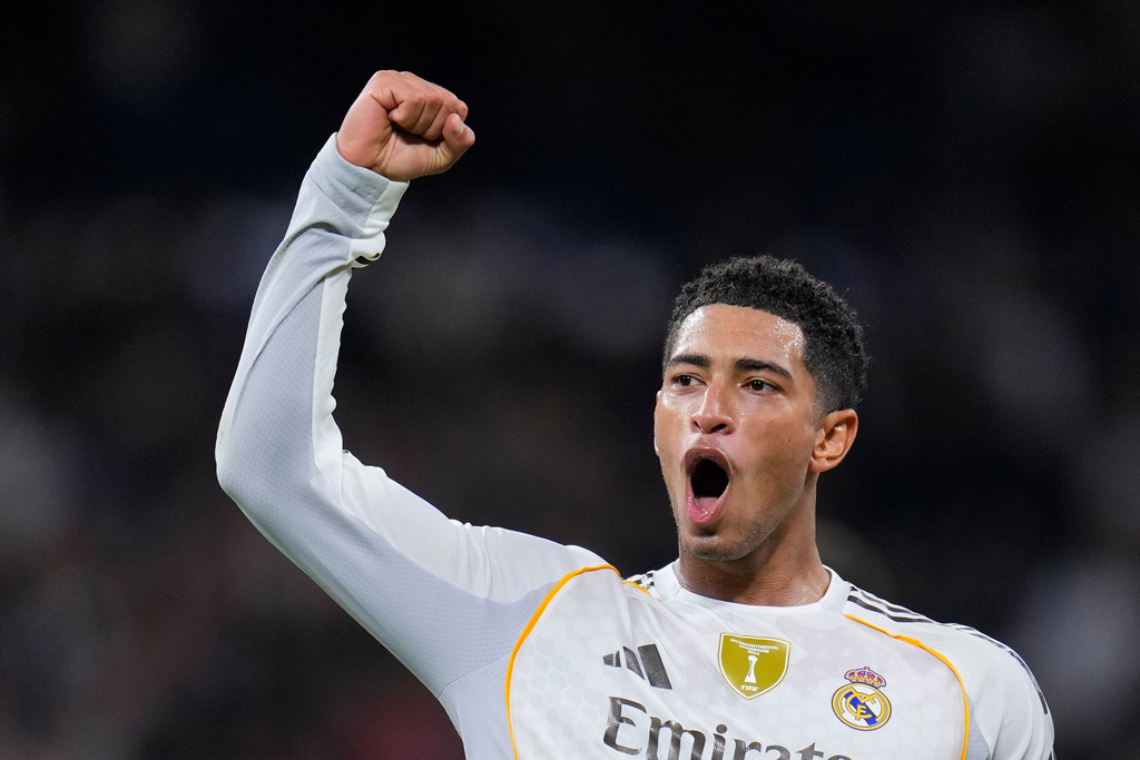 Real Madrid's Jude Bellingham celebrates after scoring his side's third goal during the Spanish La Liga soccer match between Real Madrid and Valencia in Madrid, Spain, Saturday, Nov. 1, 2025. (AP Photo/Manu Fernandez)