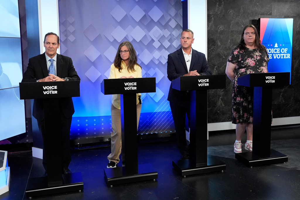 From left, U.S. Senate candidates David Costello, Elizabeth Dickerson, Dan Kleban, and Ashley Webb prepare for a televised debate at the WCSH-6 studio, Thursday, July 16, 2026, in Portland, Maine. (AP Photo/Robert F. Bukaty)