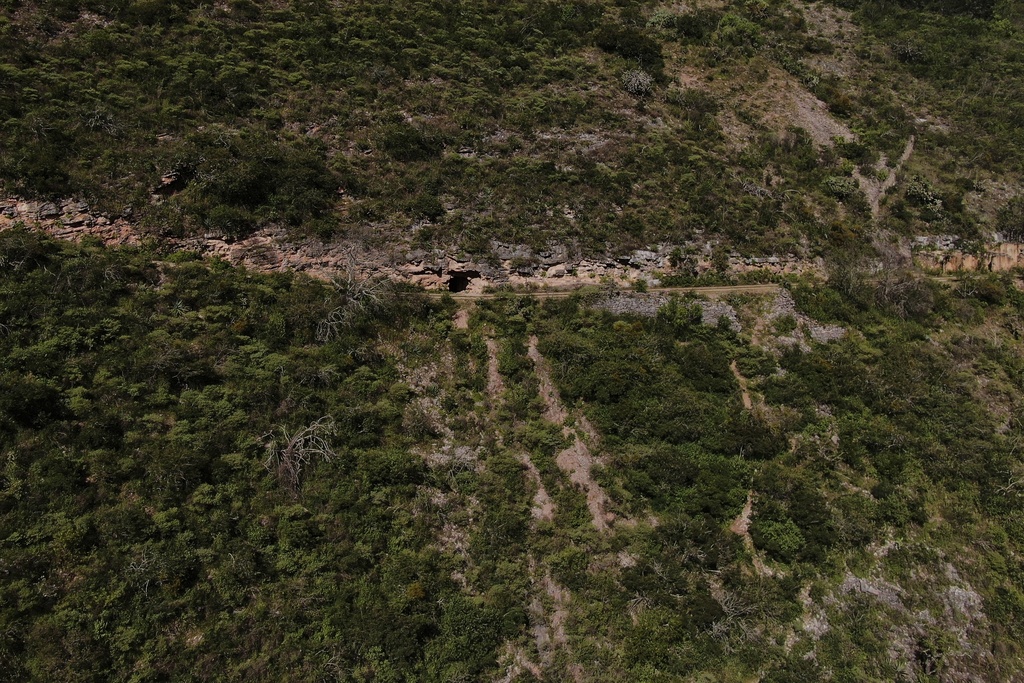 An old entrance to the mercury mine can be seen at the top of the mountain in San Joaquin, Mexico, Tuesday, Aug. 19, 2025. (AP Photo/Fernando Llano)