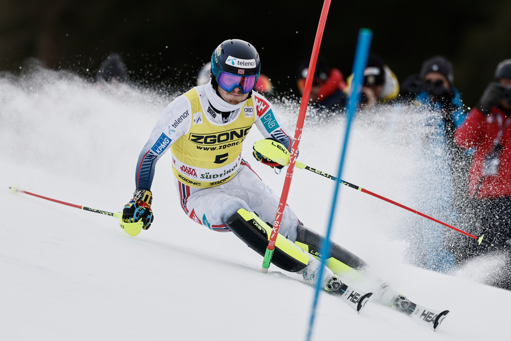 Norway's Atle Lie McGrath speeds down the course during an alpine ski, men's World Cup slalom, in Alta Badia, Italy, Monday, Dec. 22, 2025. (AP Photo/Gabriele Facciotti)