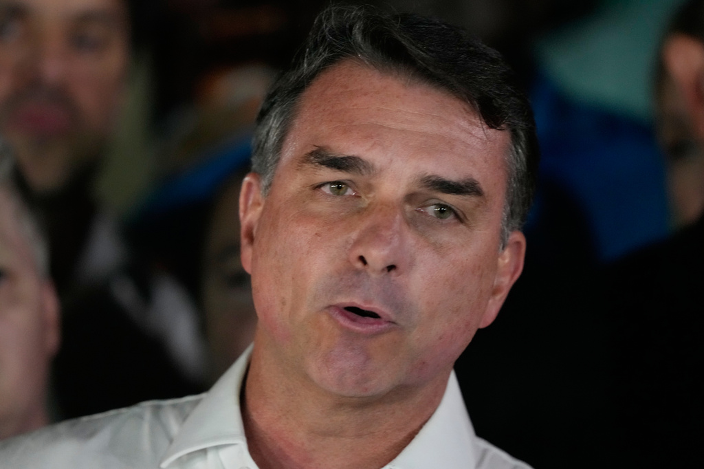 Opposition presidential candidate Sen. Flavio Bolsonaro speaks after the presidential runoff in Brasilia, Brazil, Sunday, Oct. 25, 2026. (AP Photo/Eraldo Peres)