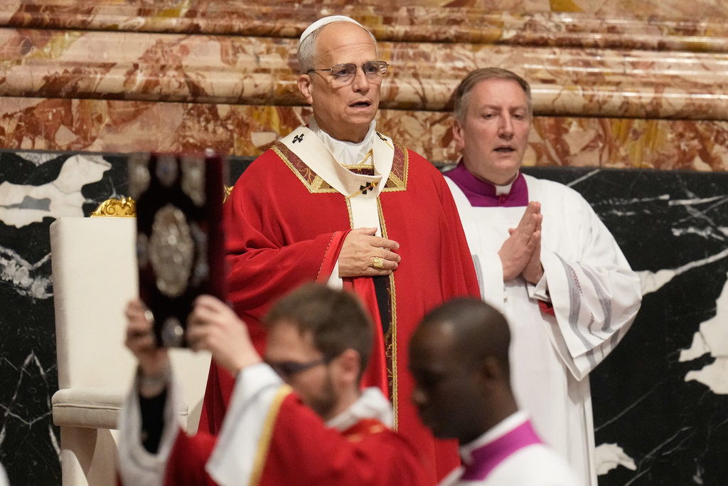 Pope Leo XIV presides over the funeral of late Cardinal Emil Paul Tscherrig in St. Peter's Basilica at The Vatican, Friday, May 15, 2026. (AP Photo/Gregorio Borgia)