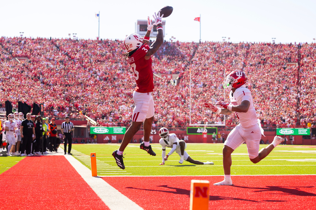 Nebraska's Kwazi Gilmer (3) catches a pass but lands out of bounds against Indiana's Amare Ferrell (1) during the first half of an NCAA college football game Saturday, Oct. 10, 2026, in Lincoln, Neb. (AP Photo/Rebecca S. Gratz)