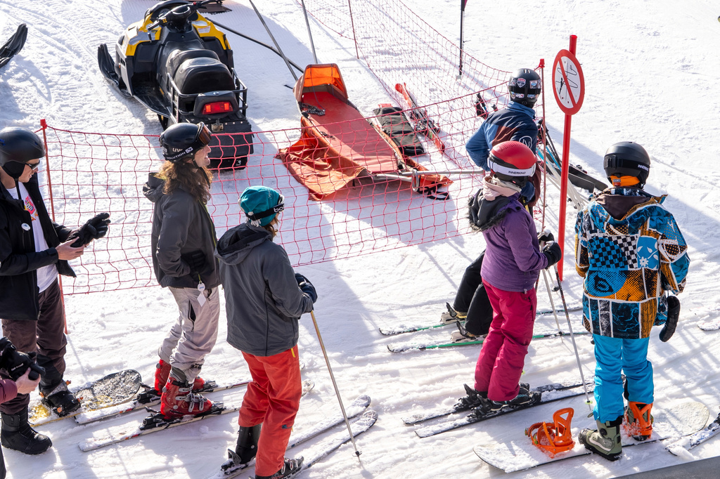 A group of skiers gather on the slopes at Afriski Mountain Resort in Maluti, Lesotho, Saturday, July 11, 2026. (AP Photo/Kayleen Morgan)