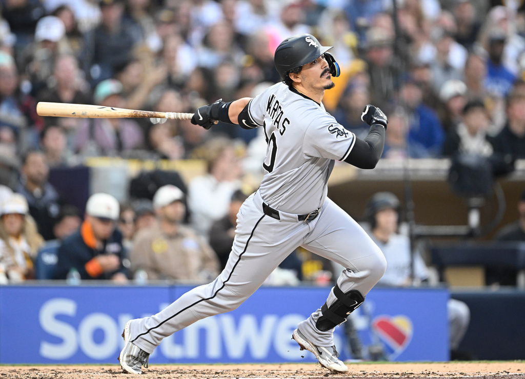 Chicago White Sox's Miguel Vargas hits an RBI single during the sixth inning of a baseball game against the San Diego Padres, Saturday, May 2, 2026, in San Diego. (AP Photo/Denis Poroy)
