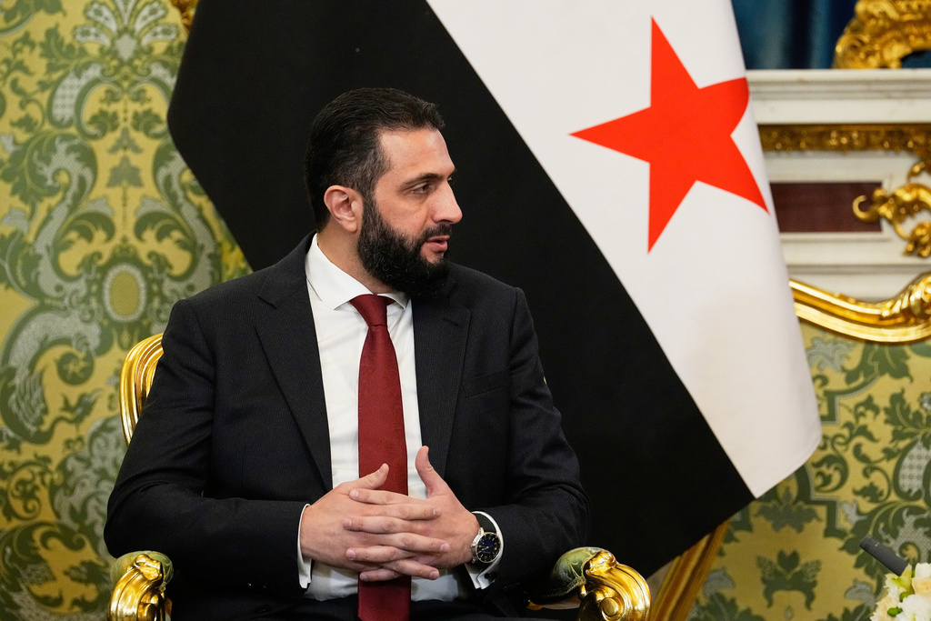 Syrian interim President Ahmad al-Sharaa speaks during a meeting with Russian President Vladimir Putin at the Grand Kremlin Palace in Moscow, Russia, Wednesday, Oct. 15, 2025. (AP Photo/Alexander Zemlianichenko, Pool)