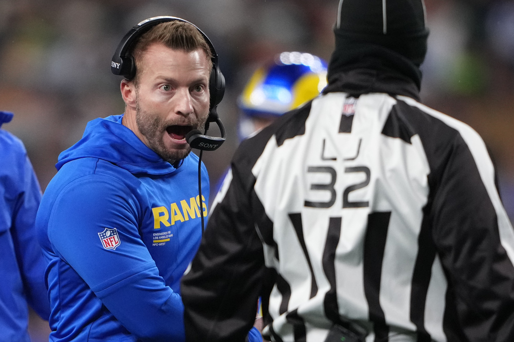 Los Angeles Rams head coach Sean McVay reacts as offensive lineman Kevin Dotson lies on the field after a play during the first half of an NFL football game against the Seattle Seahawks, Thursday, Dec. 18, 2025, in Seattle. (AP Photo/Lindsey Wasson)