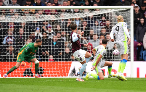 Aston Villa's Matty Cash (centre) scores his side's first goal during the English Premier League match between Aston Villa and Manchester City, in Birmingham, England, Sunday Oct. 26, 2025. (Mike Egerton/PA via AP) Aston Villa's Matty Cash (centre) scores his side's first goal during the English Premier League match between Aston Villa and Manchester City, in Birmingham, England, Sunday Oct. 26, 2025. (Mike Egerton/PA via AP)