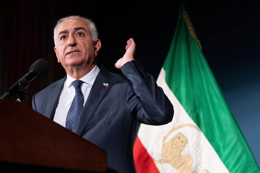 Iranian opposition leader Reza Pahlavi speaks during a news conference on Friday, Jan. 16, 2026, in Washington. (AP Photo/Mark Schiefelbein)