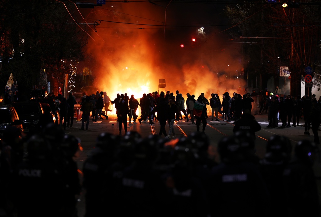 Police clash with protesters during a rally against austerity measures in next year's draft budget, in Sofia, Monday, Dec 1, 2025. (AP Photo/Valentina Petrova)