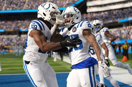 Indianapolis Colts running back Ameer Abdullah (26) celebrates a kickoff return with linebacker Buddy Johnson (59) against the Los Angeles Chargers during the second half of an NFL football game Sunday, Oct. 19, 2025, in Inglewood, Calif. (AP Photo/Gregory Bull) Indianapolis Colts running back Ameer Abdullah (26) celebrates a kickoff return with linebacker Buddy Johnson (59) against the Los Angeles Chargers during the second half of an NFL football game Sunday, Oct. 19, 2025, in Inglewood, Calif. (AP Photo/Gregory Bull)