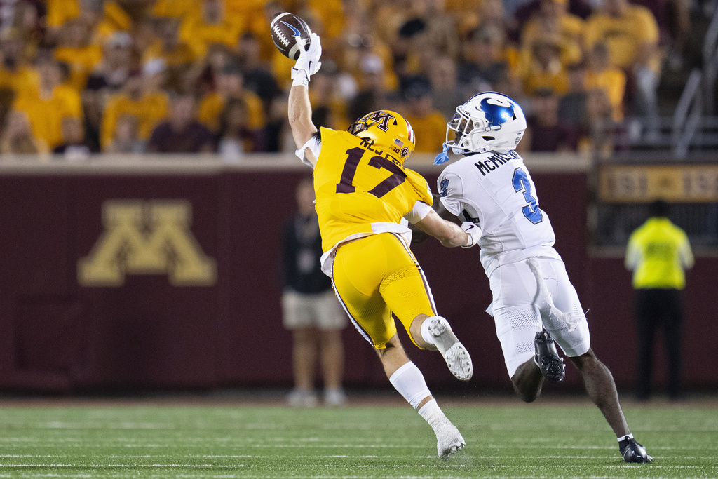 Minnesota defensive back John Nestor (17) knocks a pass-attempt away from Buffalo wide receiver Nik McMillan (3) in the second quarter of an NCAA college football game in Minneapolis, Thursday, Aug. 28, 2025. (Alex Kormann/Star Tribune via AP)