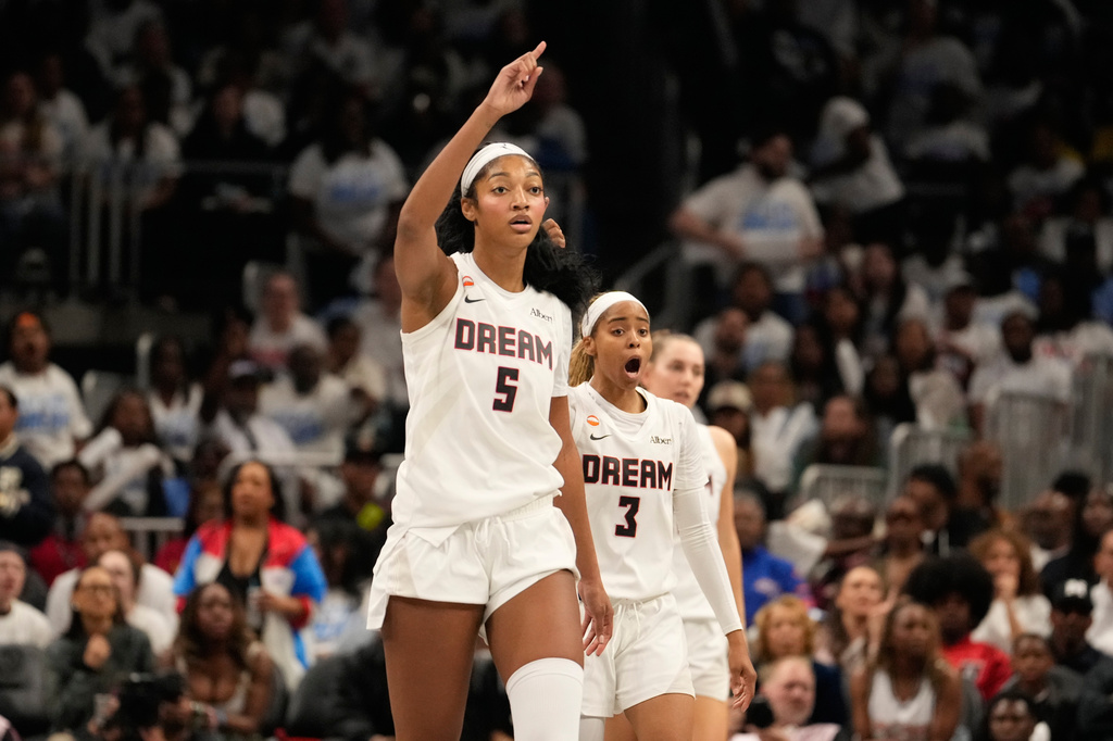 Atlanta Dream forward Angel Reese (5) and Atlanta Dream guard Jordin Canada (3) react to a foul in the second half during Game 4 of the WNBA basketball finals on Saturday, Oct. 24, 2026, in Atlanta. (AP Photo/Brynn Anderson)