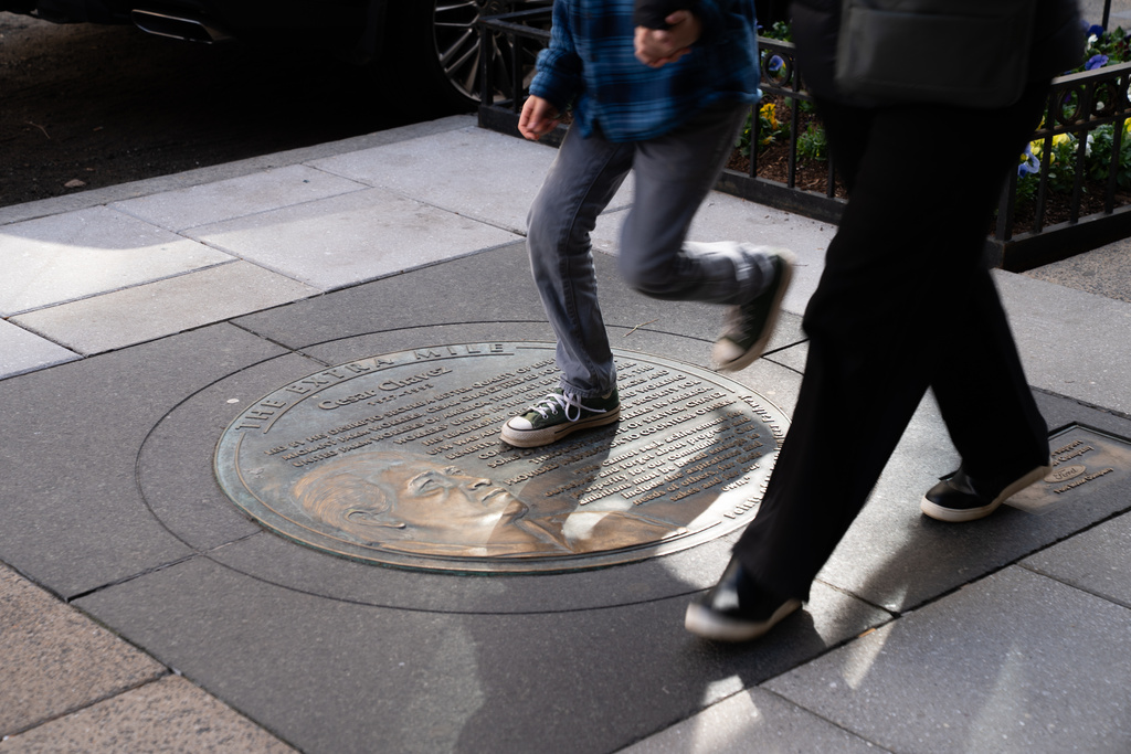 A marker in honor of César Chavez along the Points of Light: Volunteer Pathway on Thursday, March 19, 2026, in Washington. (AP Photo/Allison Robbert)