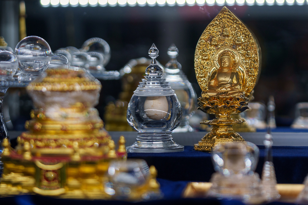 Buddhist relics, including shariras and bones believed to be those of the Buddha, are displayed at Wei Mountain Temple, in Rosemead, Calif., Saturday, Feb. 17, 2024. (AP Photo/Damian Dovarganes)