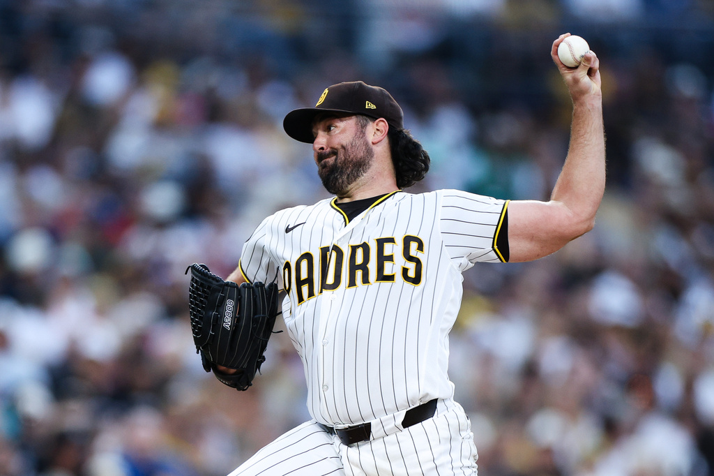 San Diego Padres' Robbie Ray winds up against a Pittsburgh Pirates batter in the second inning of a baseball game Monday, Aug. 24, 2026, in San Diego. (AP Photo/Derrick Tuskan)