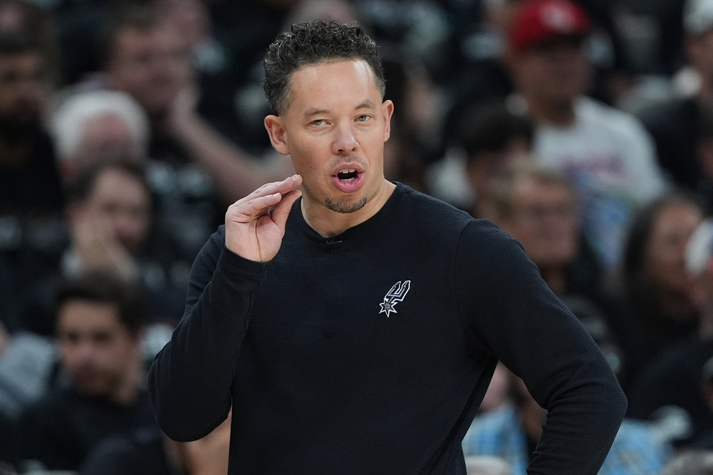 San Antonio Spurs head coach Mitch Johnson talks to his players during the first half in Game 2 of a second-round NBA playoffs basketball series against the Minnesota Timberwolves in San Antonio, Wednesday, May 6, 2026. (AP Photo/Eric Gay)