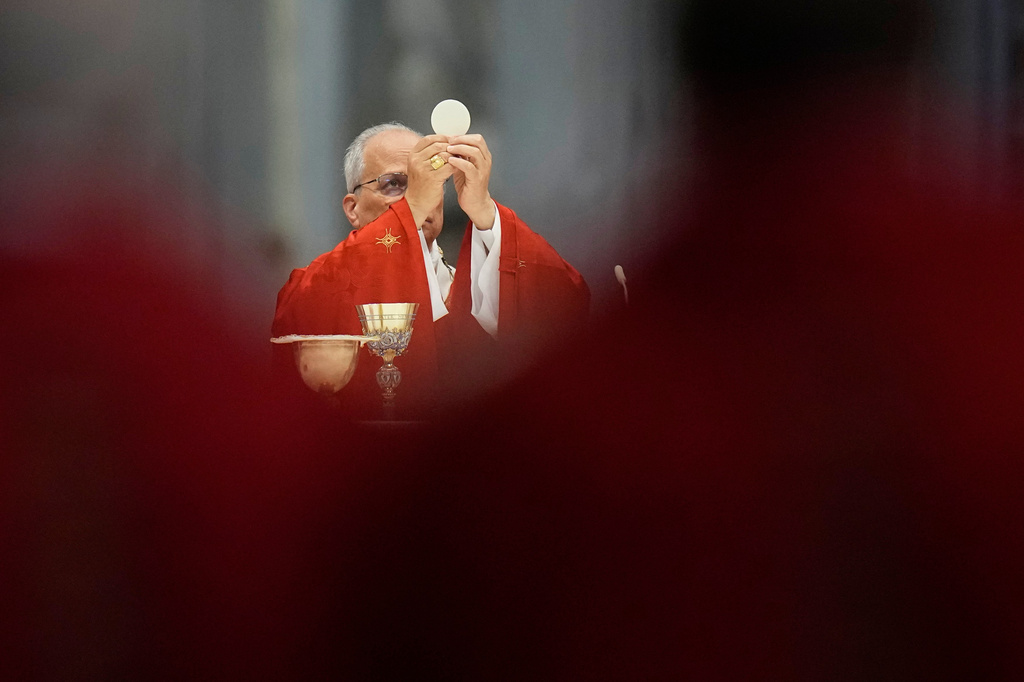 Pope Leo XIV celebrates a Mass in St. Peter's Basilica at the Vatican, Monday, June 29, 2026, where he conferred the pallium on newly appointed metropolitan archbishops. (AP Photo/Alessandra Tarantino)