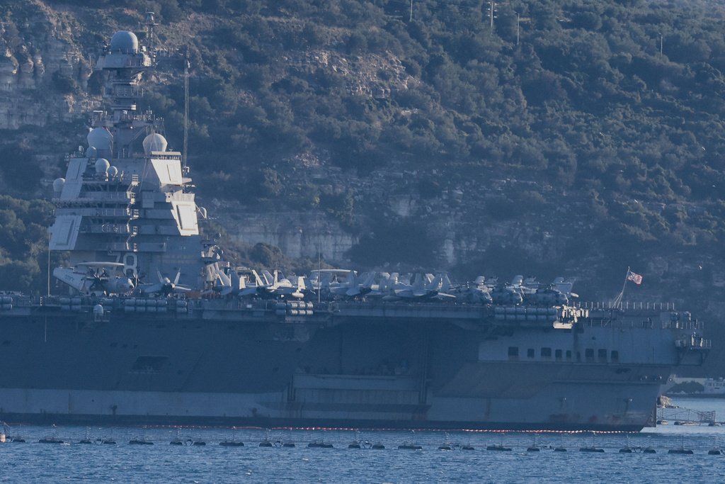 The US Navy's aircraft carrier USS Gerald R. Ford is docked at Souda naval base near the city of Chania, on the southern island of Crete, Greece, on Tuesday, Feb. 24, 2026. (AP Photo/Giannis Angelakis)