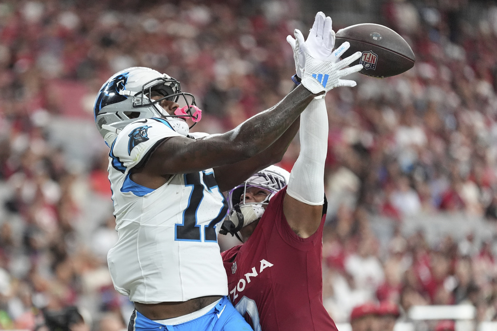Arizona Cardinals cornerback Will Johnson breaks up a pass intended for Carolina Panthers wide receiver Xavier Legette (17) during the second half of an NFL football game, Sunday, Sept. 14, 2025, in Glendale, Ariz. (AP Photo/Ross D. Franklin)