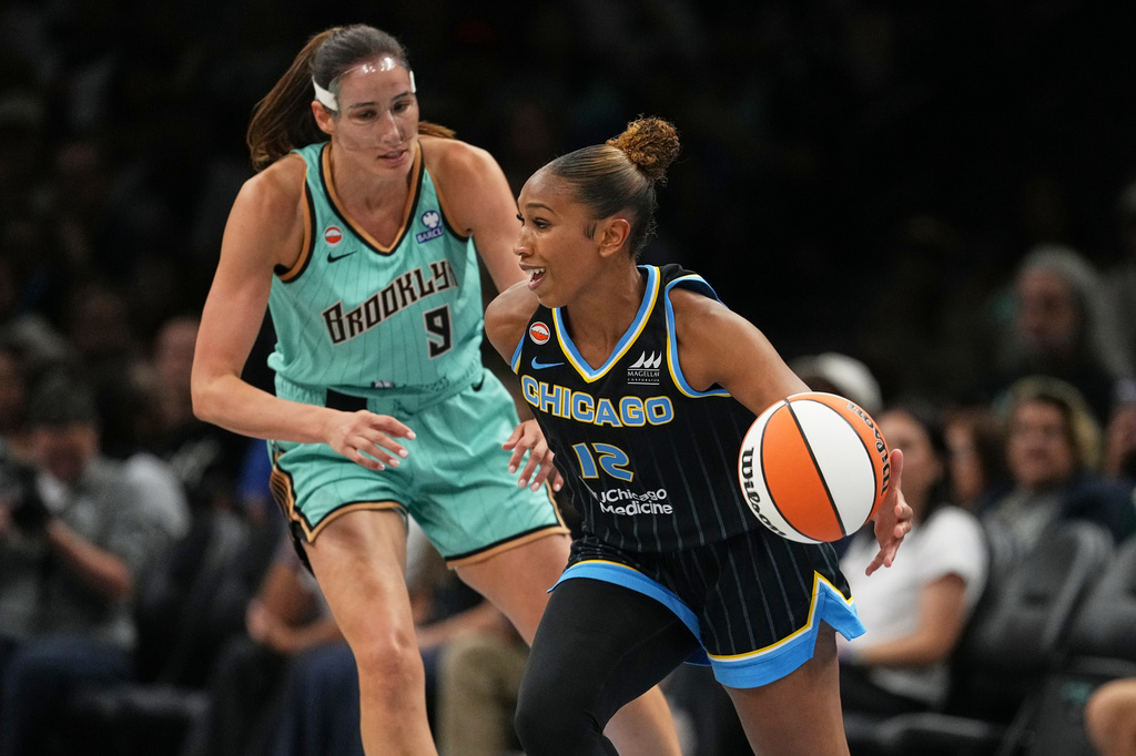 New York Liberty's Rebecca Allen, left, defends Chicago Sky's Sydney Taylor during the second half of a WNBA basketball game Wednesday, July 22, 2026, in New York. (AP Photo/Frank Franklin II)