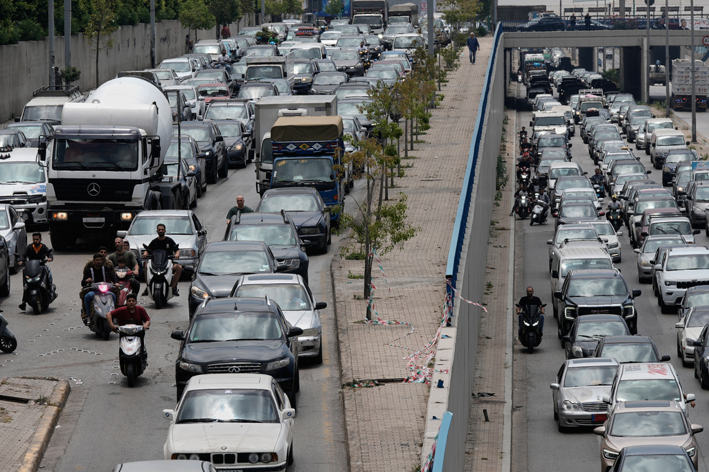Cars sit in traffic on a highway as residents flee following an Israeli threat to strike Dahiyeh, Beirut's southern suburbs, Lebanon, Monday, June 1, 2026. (AP Photo/Bilal Hussein)