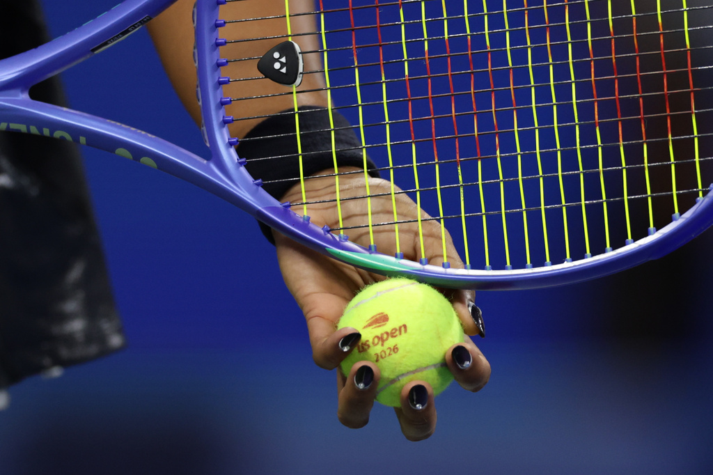 Naomi Osaka, of Japan, prepares to serve to Elise Mertens, of Belgium, during the third round of the U.S. Open tennis championships, Saturday, Sept. 5, 2026, in New York. (AP Photo/Adam Hunger)