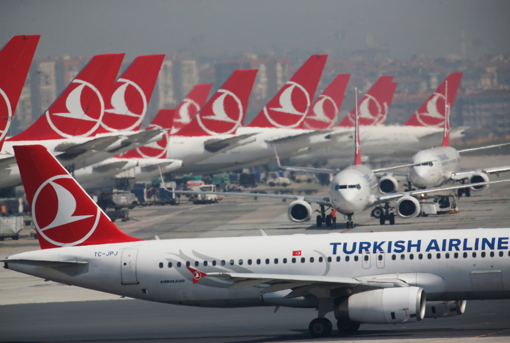FILE - Turkish Airlines airplanes are parked at Ataturk International Airport, in Istanbul, Friday, April 5, 2019. (AP Photo/Lefteris Pitarakis, File)