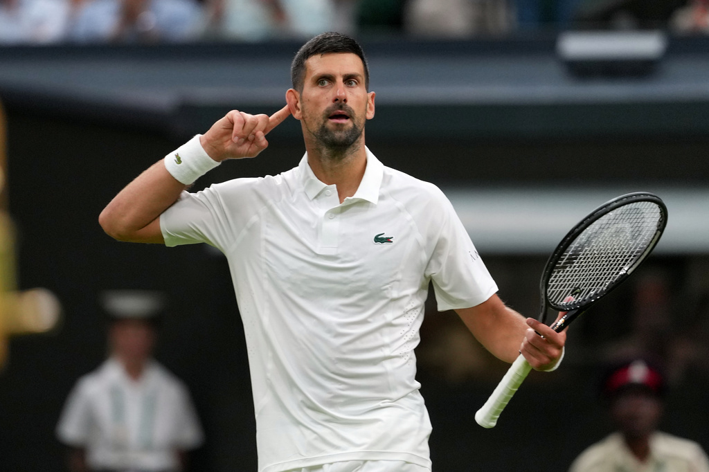 Novak Djokovic of Serbia reacts during the men's singles match against Yibing Wu of China at the Wimbledon Tennis Championships in London, Monday, June 29, 2026.(AP Photo/Kin Cheung)