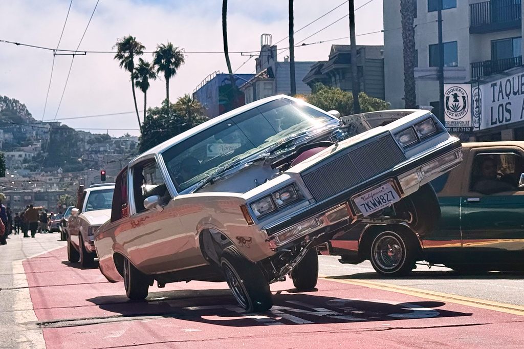 Drivers participate in the annual King of the Streets event celebrating lowriding, a Mexican American and Chicano cultural tradition rooted in car customization, Saturday, Sept. 19, 2026, in San Francisco. (AP Photo/Haven Daley)