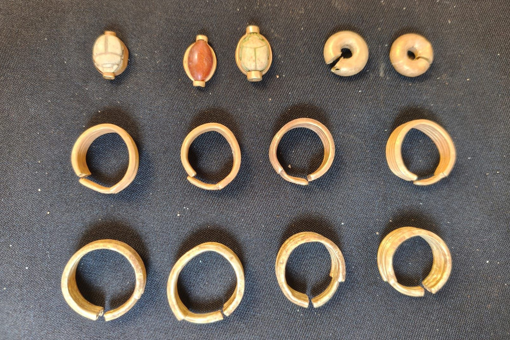 In this photo provided by Ministry of Tourism and Antiquities, recently unearthed ancient artifacts are displayed on May 31, 2026, in Ehnasiya district in Beni Suef, 130 kilometers (80 miles) south of Cairo, Egypt. (Ministry of Tourism and Antiquities via AP)